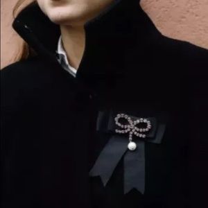 NEW ERDEM X H&M COLLAB
SIGNATURE GROSGRAIN BROOCH